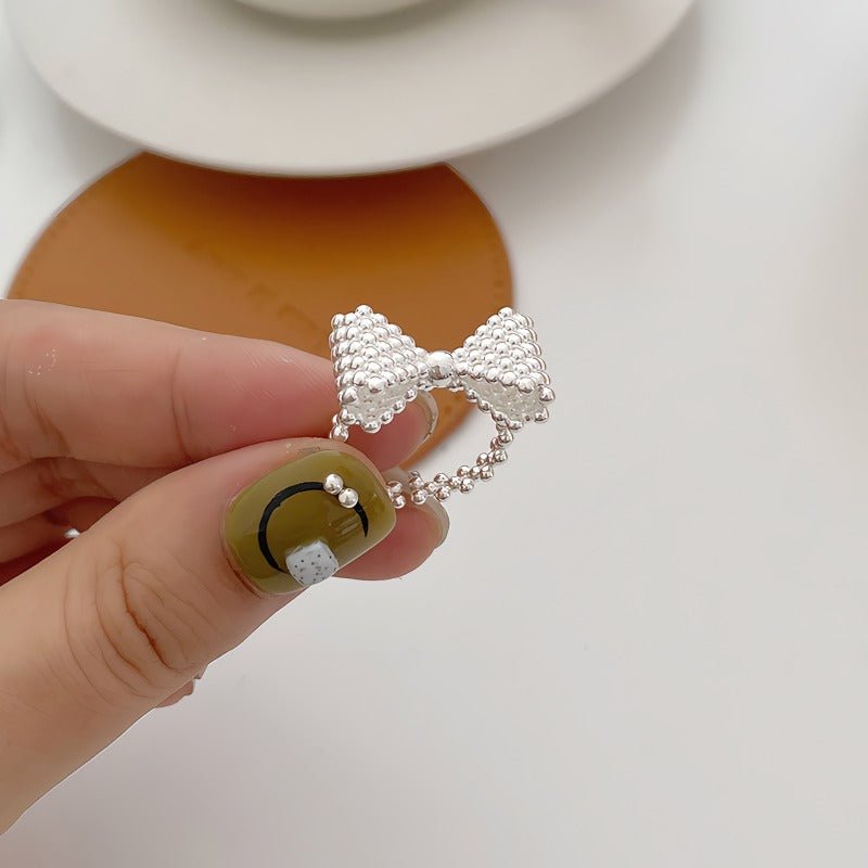 925 Sterling Sølv Sløjfe Formet Ring – Elegant og Justerbar Design - Lilla Villa