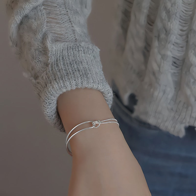 Elegant 925 Sterling Sølv Armbånd med Dobbelt Bue & Knudedetalje