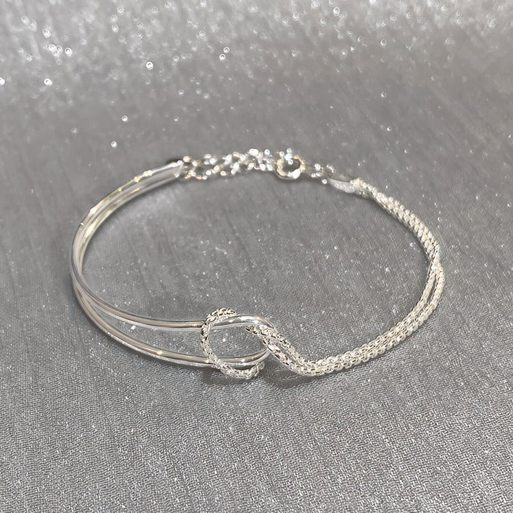 Elegant 925 Sterling Sølv Armbånd med Dobbelt Bue & Knudedetalje