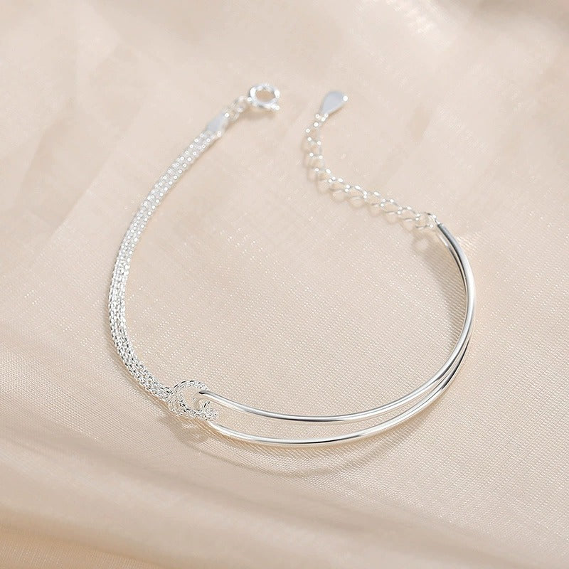 Elegant 925 Sterling Sølv Armbånd med Dobbelt Bue & Knudedetalje