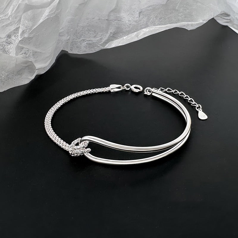 Elegant 925 Sterling Sølv Armbånd med Dobbelt Bue & Knudedetalje