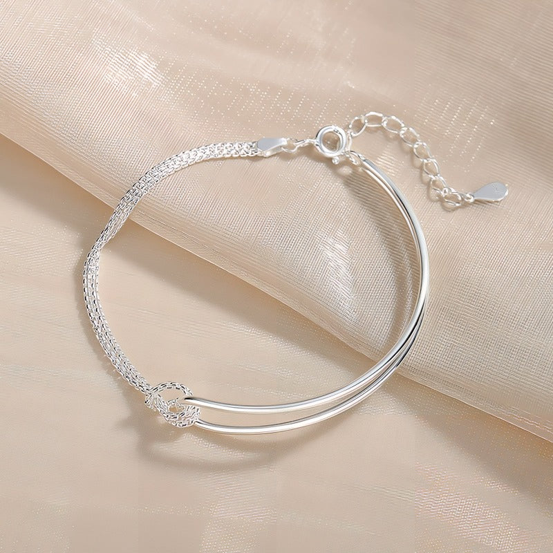 Elegant 925 Sterling Sølv Armbånd med Dobbelt Bue & Knudedetalje