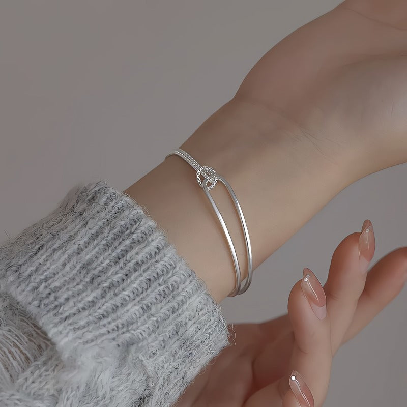 Elegant 925 Sterling Sølv Armbånd med Dobbelt Bue & Knudedetalje