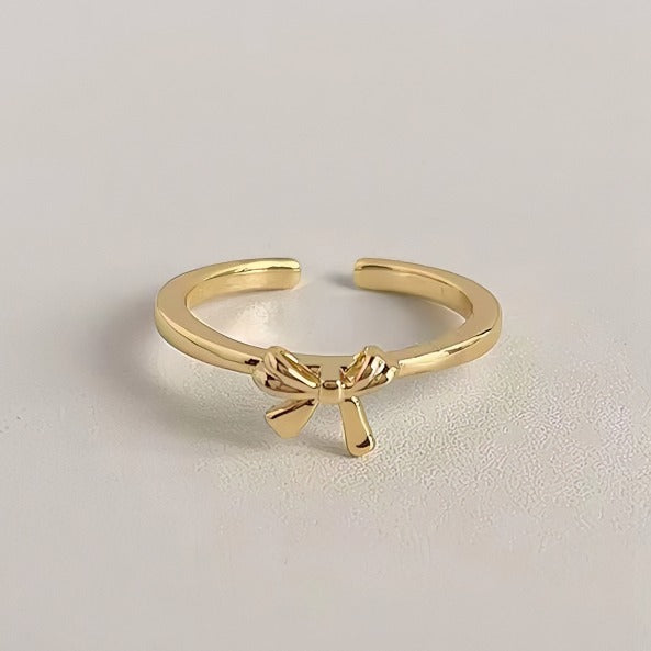 Elegant Sløjfeformet Åben Ring i Forgyldt – Justerbart Design