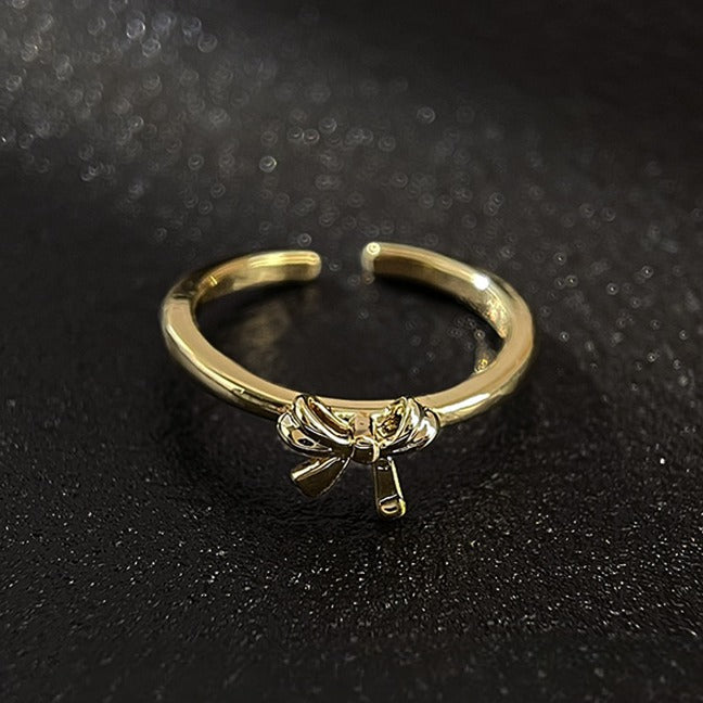 Elegant Sløjfeformet Åben Ring i Forgyldt – Justerbart Design