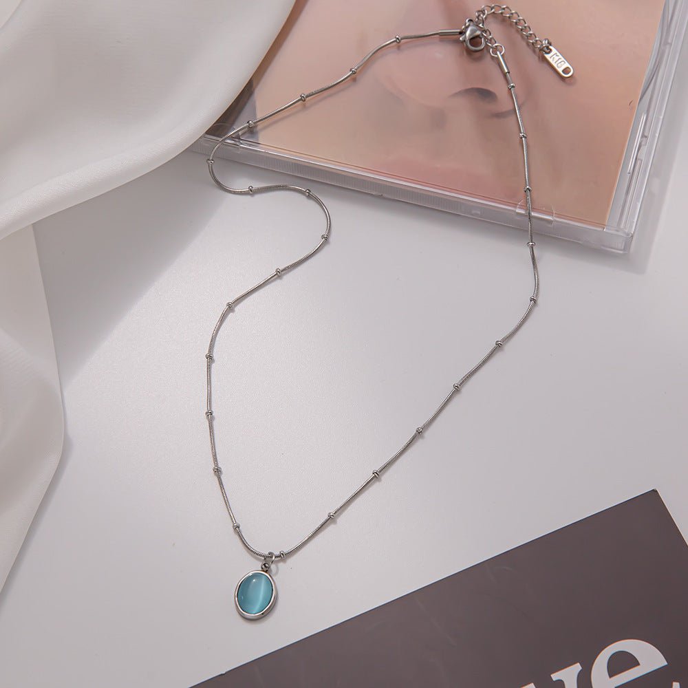 Hvidguld Belagt Rustfrit Stål Halskæde med Chrysoberyl Øje - effekt Sten – Elegant og Tidløst Design - Lilla Villa