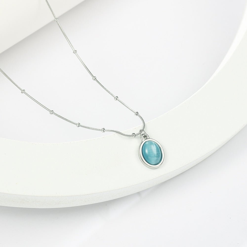 Hvidguld Belagt Rustfrit Stål Halskæde med Chrysoberyl Øje - effekt Sten – Elegant og Tidløst Design - Lilla Villa